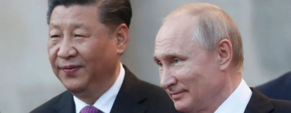 Russian President Vladimir Putin (right) and Chinese President Xi Jinping CBC News | James Alexander Michie