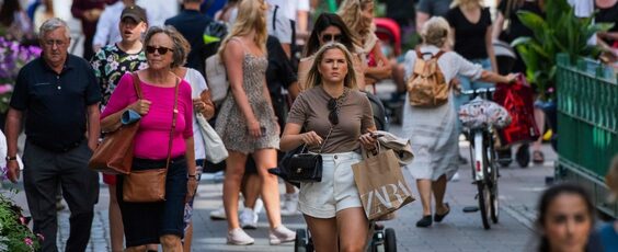 People walk in Stockholm Getty Images Reuters National Post | James Alexander Michie